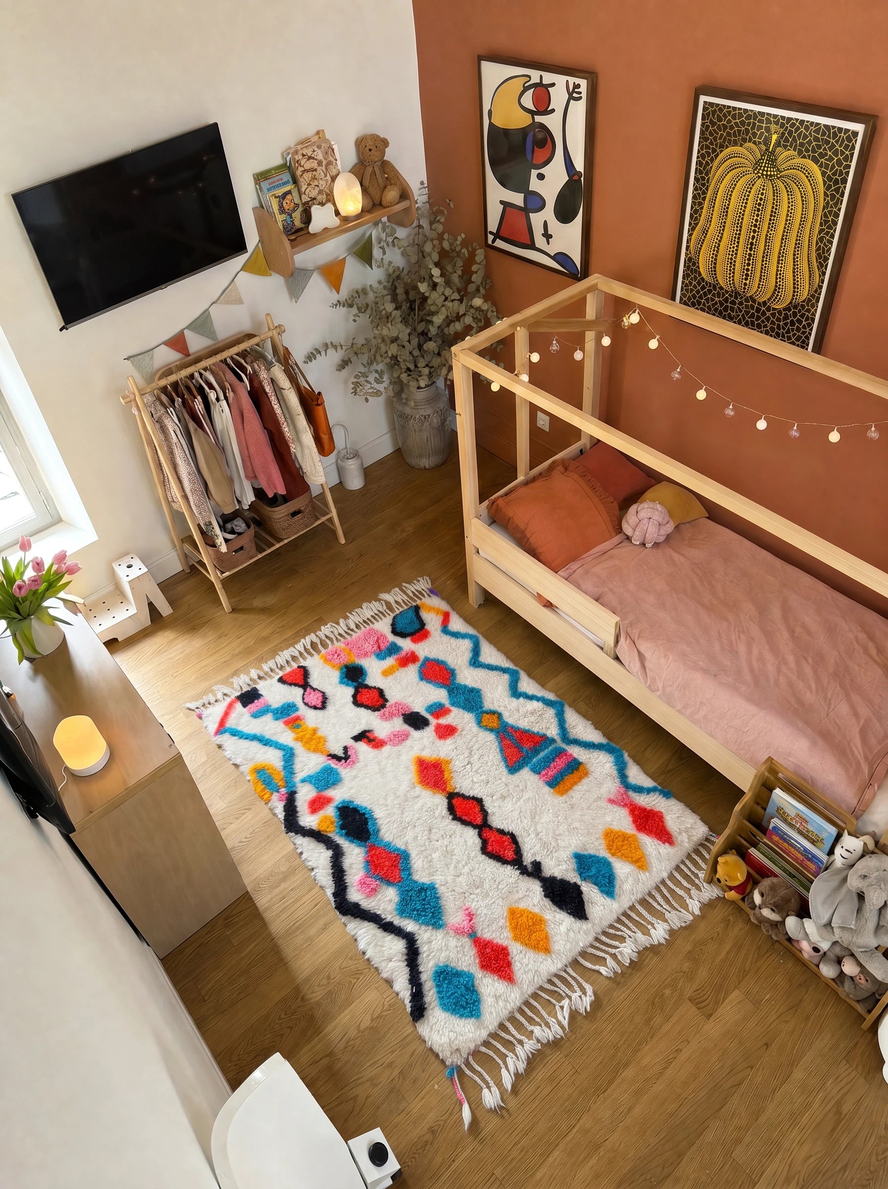 Colorful Berber rug 102 x 161 cm in a living room setting, handmade in wool | Tamazi